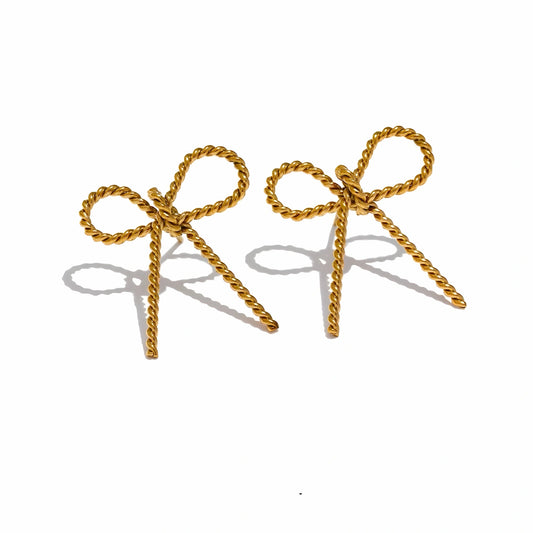 BEHI MILANO Francy Earrings — 18k gold twisted rope bow stud earrings on white background