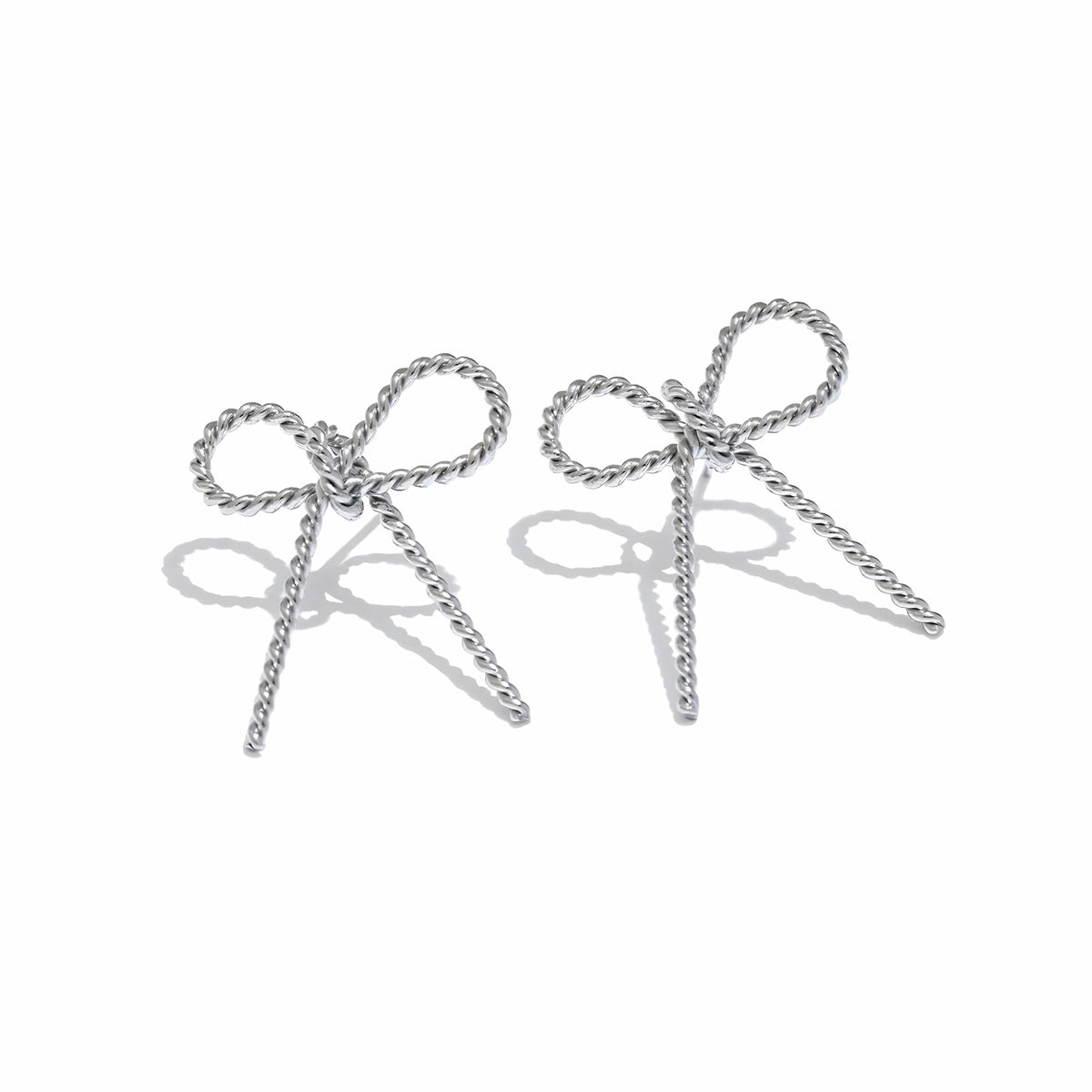 BEHI MILANO Francy Earrings — silver twisted rope bow stud earrings on white background
