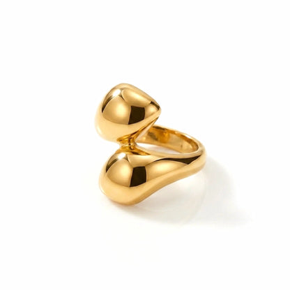 BEHI MILANO Garlita Ring — 18k gold open sculptural bypass statement ring on white background