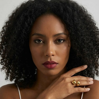 BEHI MILANO Garlita Ring — front portrait of model wearing gold sculptural ring