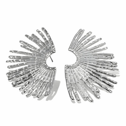 BEHI MILANO Indigo Earrings — silver textured sunburst fan stud earrings on white background