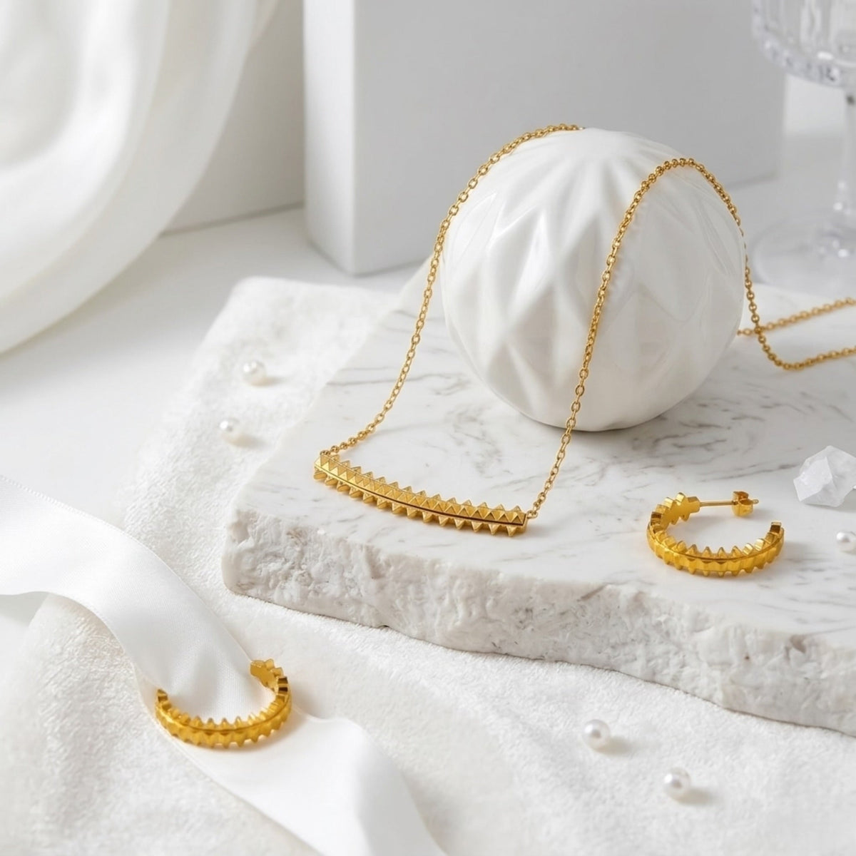 BEHI MILANO Isla Collection — matching 18k gold pyramid bar necklace and hoop earrings display