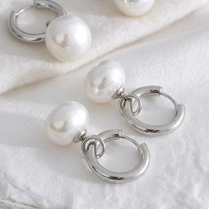 BEHI MILANO Jade Earrings — silver stainless steel pearl drop hoop earrings on white silk