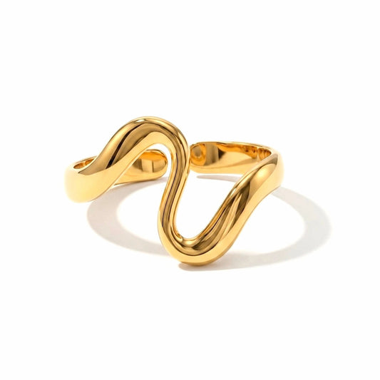 BEHI MILANO Jojo Ring — 18k gold-plated sculptural S-wave adjustable ring on white background