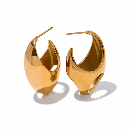BEHI MILANO Judy Earrings — 18k gold chunky teardrop hoop earrings on white background