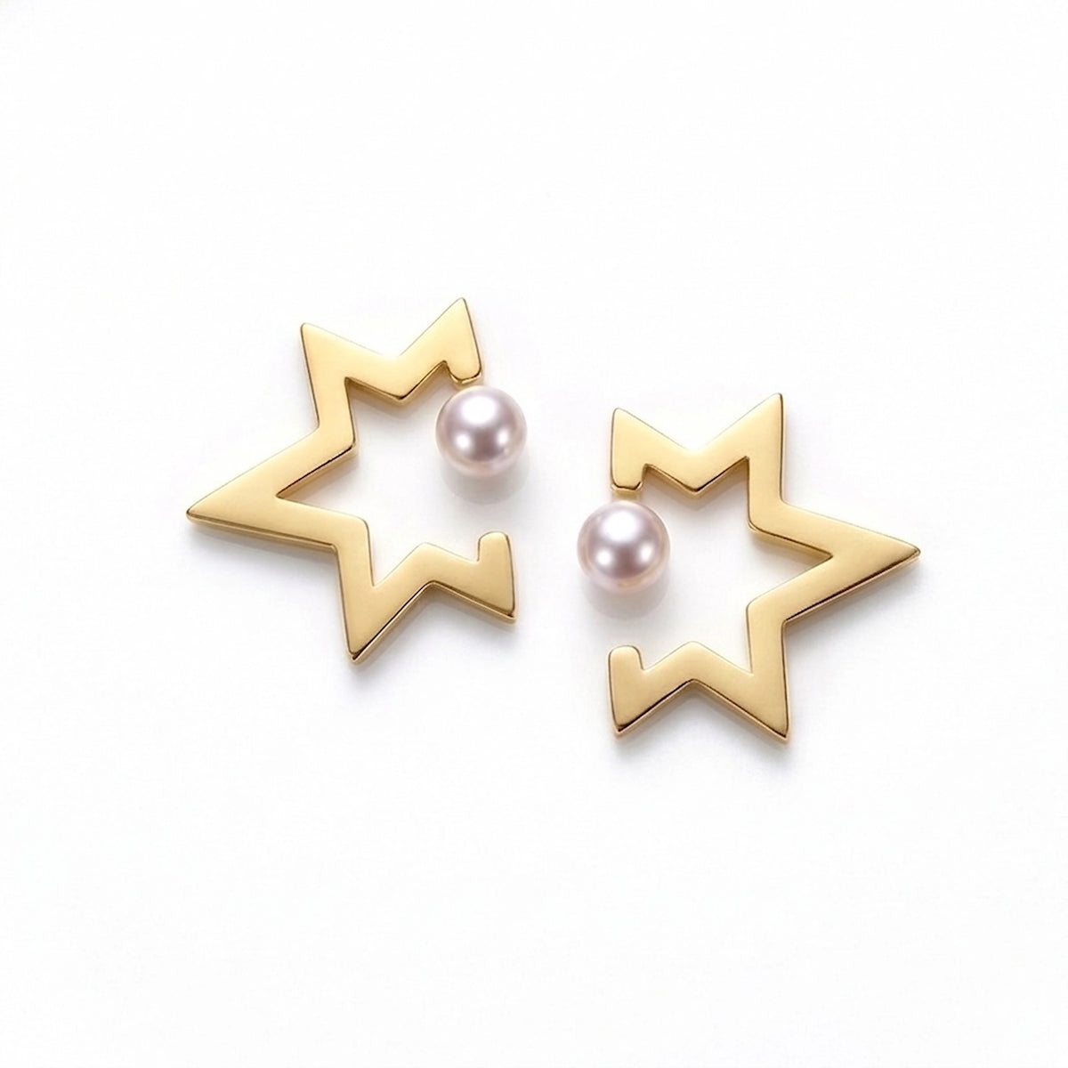 BEHI MILANO Kaia Earrings — 18k gold open star outline earrings with pearl accent on white background