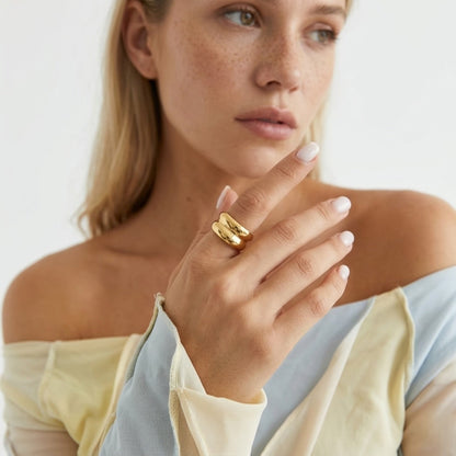 BEHI MILANO Katrina Ring — lifestyle model hand wearing gold double dome band ring
