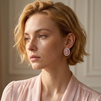 BEHI MILANO Lady Earrings — portrait view of model wearing pink organza dress and gold pearl cameo stud earrings