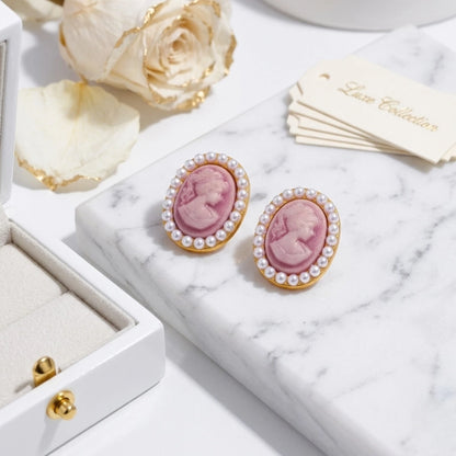BEHI MILANO Lady Earrings — pink cameo pearl stud earrings resting on white ceramic tray with vintage key