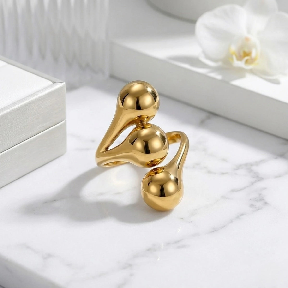 BEHI MILANO Letiz Ring — gold organic adjustable ring displayed on white studio block