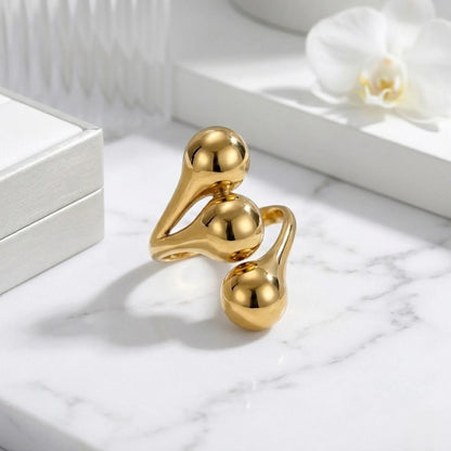 BEHI MILANO Letiz Ring — gold organic adjustable ring displayed on white studio block